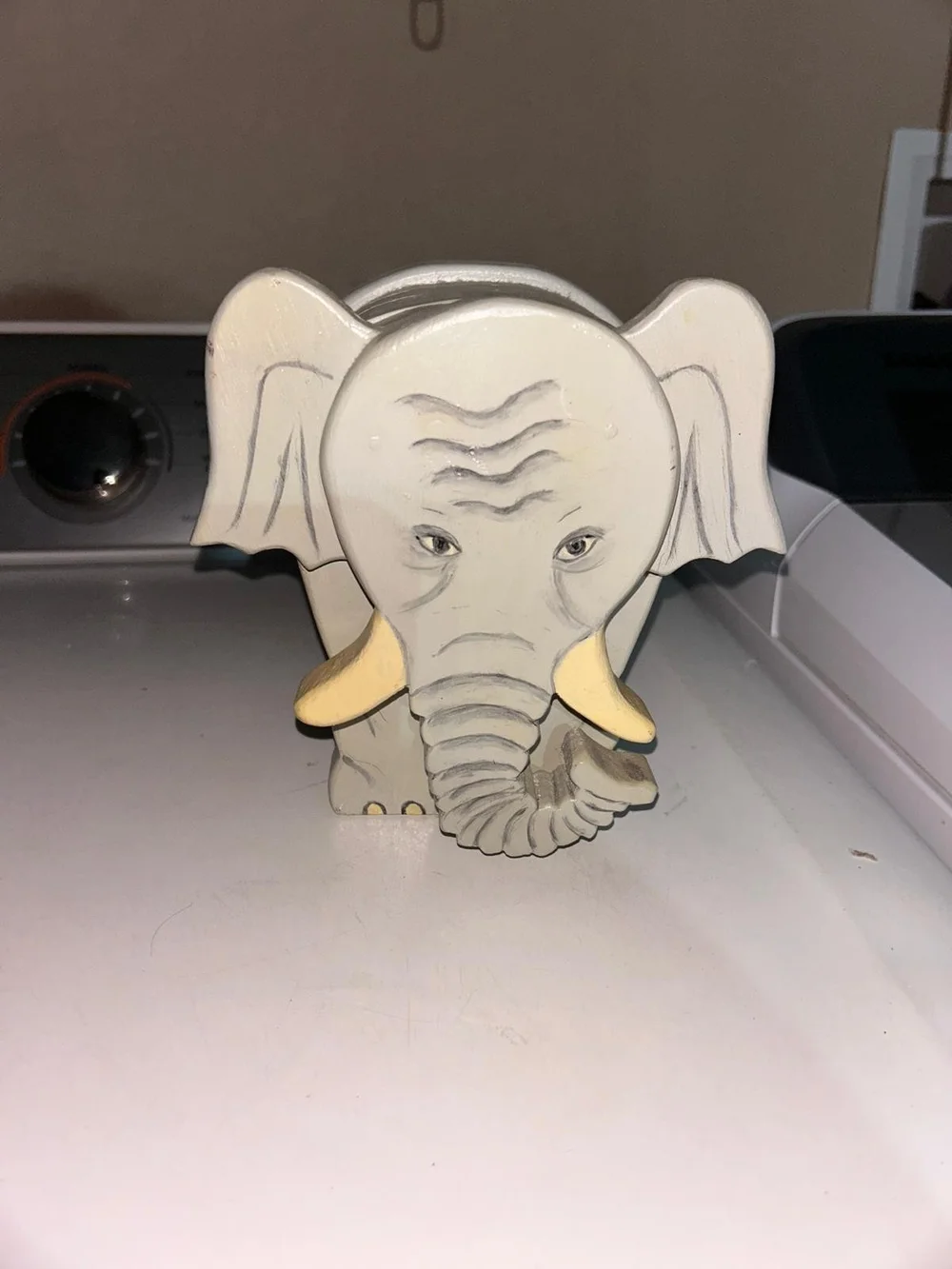 a vintage, handcrafted wood block elephant figurine.
